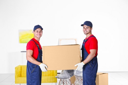 Packed boxes and furniture ready for transport during a local move