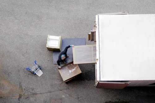 Local movers loading furniture for a Hampstead home relocation