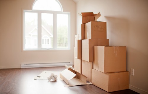 Office furniture and boxes prepared for a commercial move in Hampstead