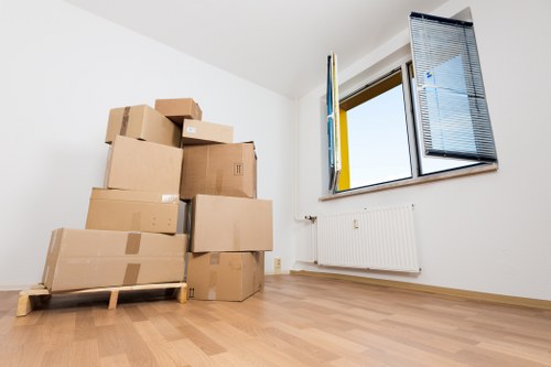 Professional moving team handling home removals on a Hampstead residential street