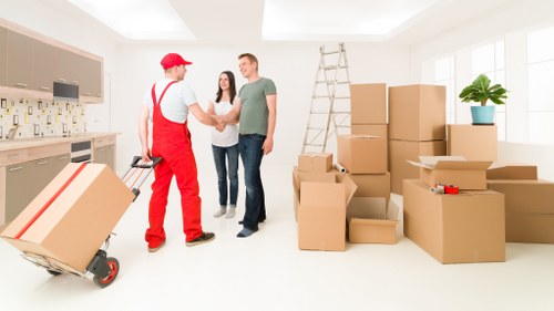 Packed moving boxes and furniture protection materials for a Hampstead house move