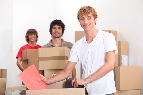 Packed boxes and furniture ready for transport in a Hampstead home